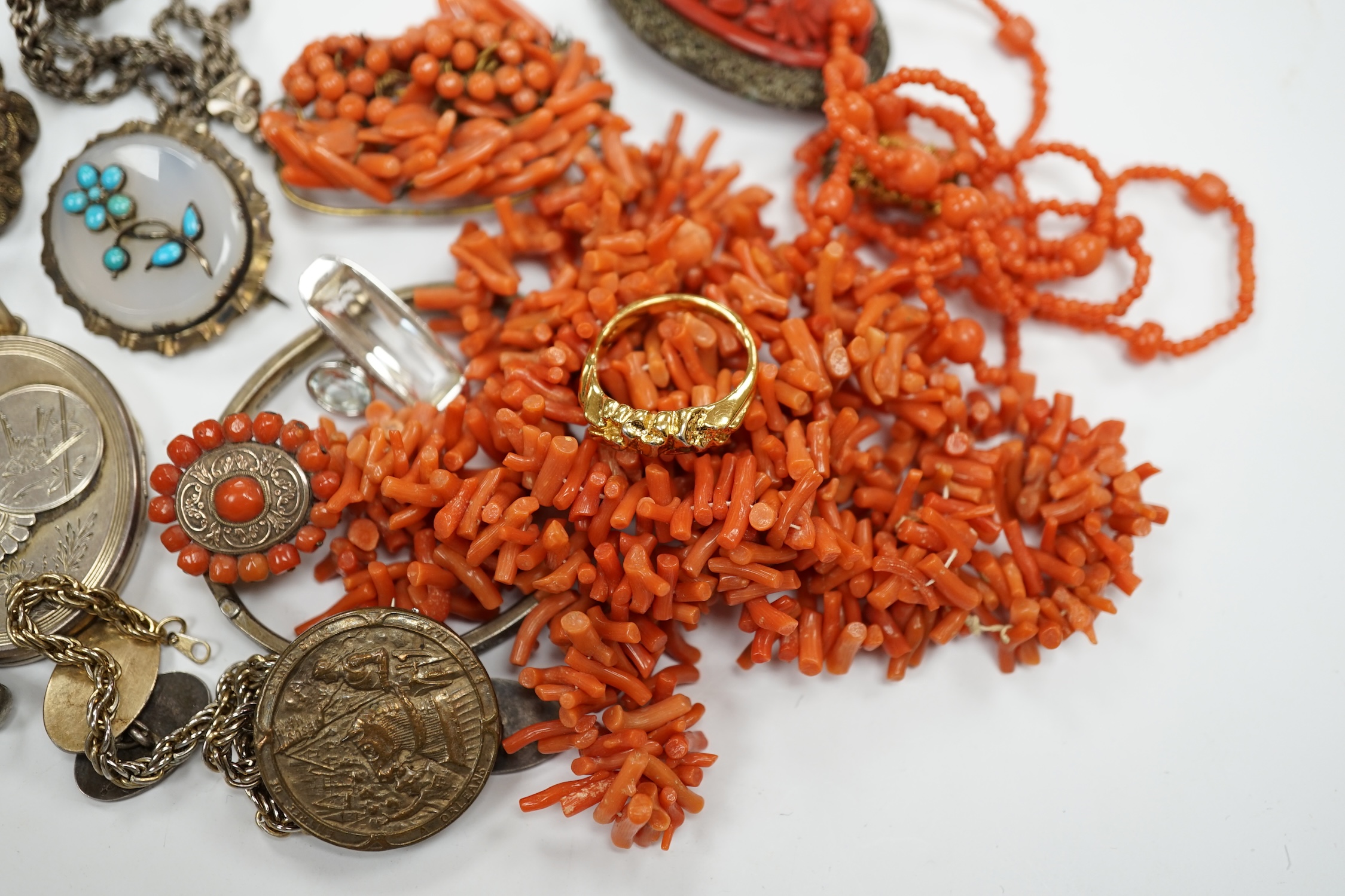 A group of assorted jewellery including costume, coral necklaces, chalcedony and turquoise set brooch, sterling bangle etc. Condition - poor to fair